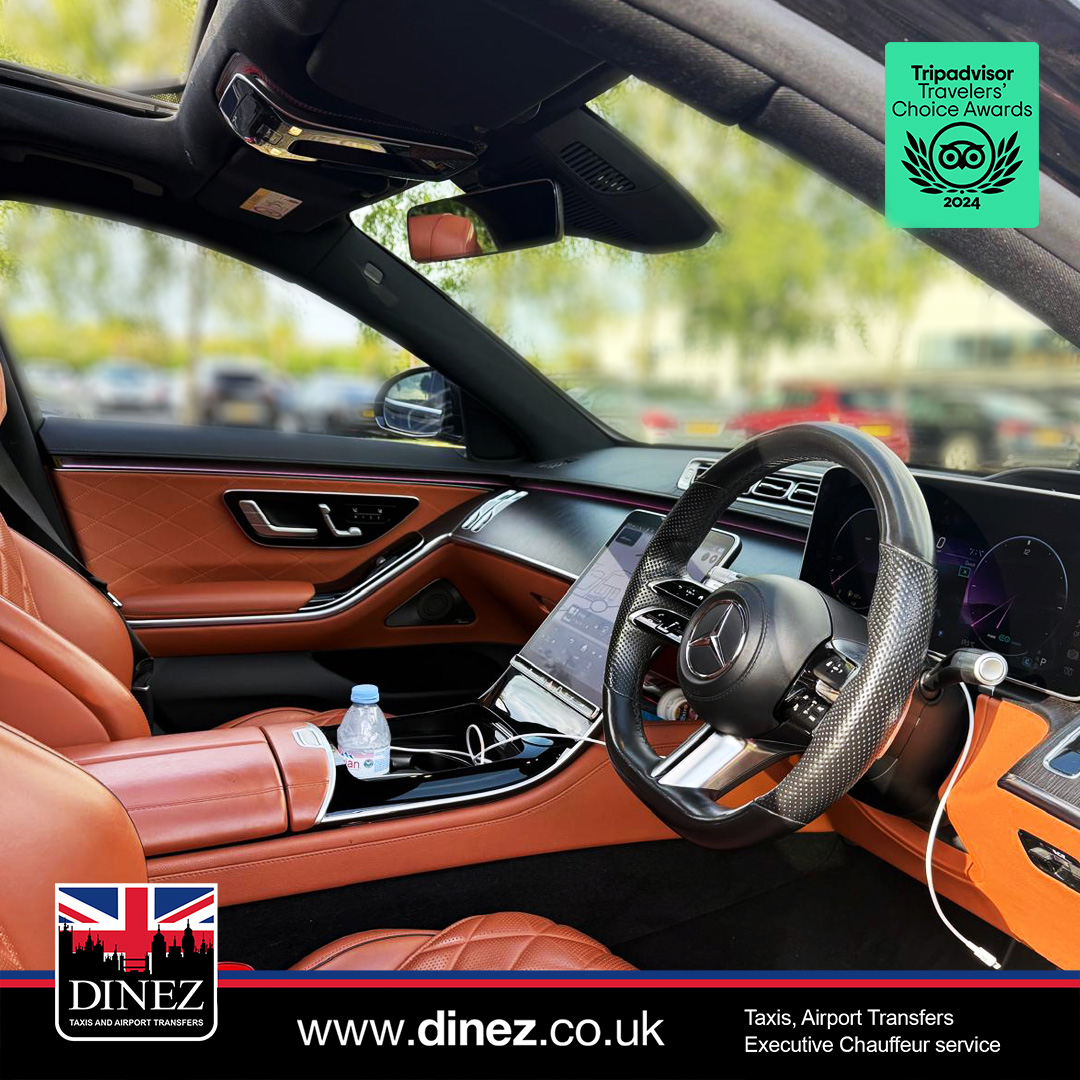 Cognac leather, the front cabin with tablet and AMG wheel inside a Mercedes-Benz S-Class from the Farnborough Taxi Cabs